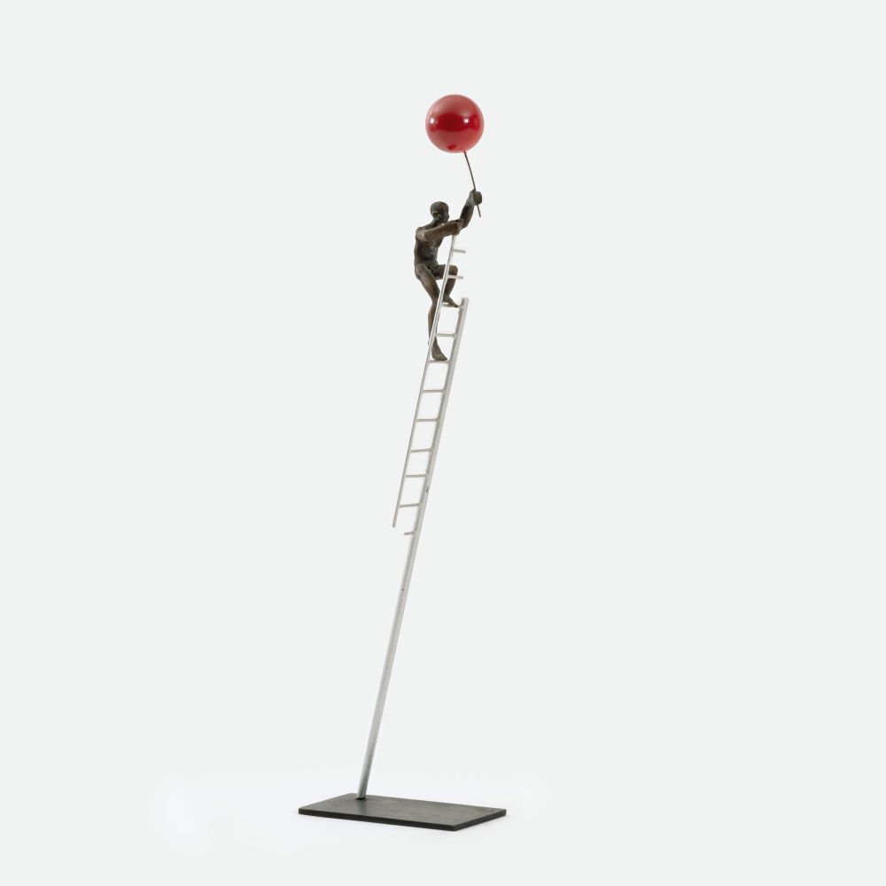A Climber with Red Balloon