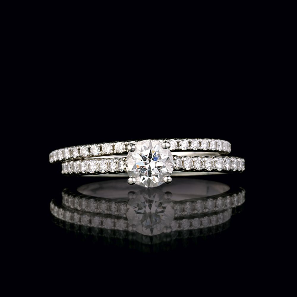 Tiffany & Co. - A Solitaire Diamond Ring with Supporting Ring A Solitaire Diamond Ring with Supporting Ring