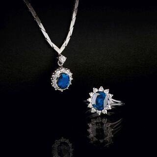 A Sapphire Diamond Ring with matching Pendant on Necklace