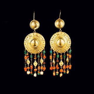 A Pair of gold Medaillon Earpendants pre-Columbian