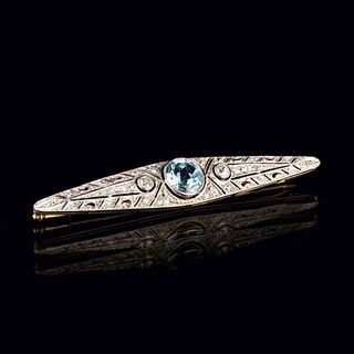 An Art-déco Blue Topaz Brooch with Diamonds