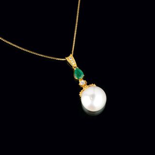 A Southsea Emerald Diamond Pendant on Necklace