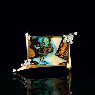 A Boulder Opal Brooch with Diamonds