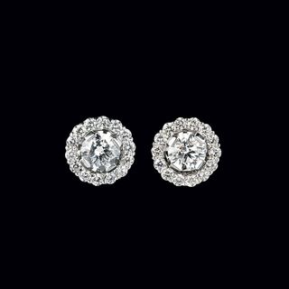 A Pair of River Solitaire Diamond Earstuds with Diamonds