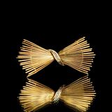 A Vintage Gold Brooch with Diamonds