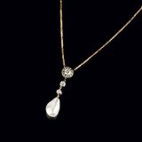 An Art Nouveau Diamond Pearl Pendant