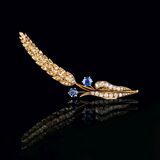 An Art Nouveau Diamond Sapphire Brooch 'Fleur de plumes'