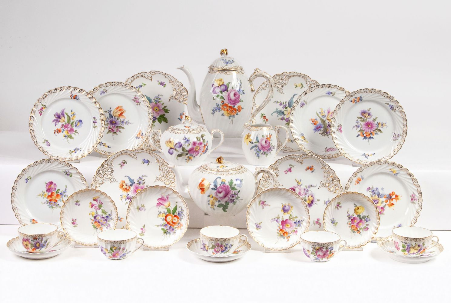 A Coffee and Tea Service with Floral Painting