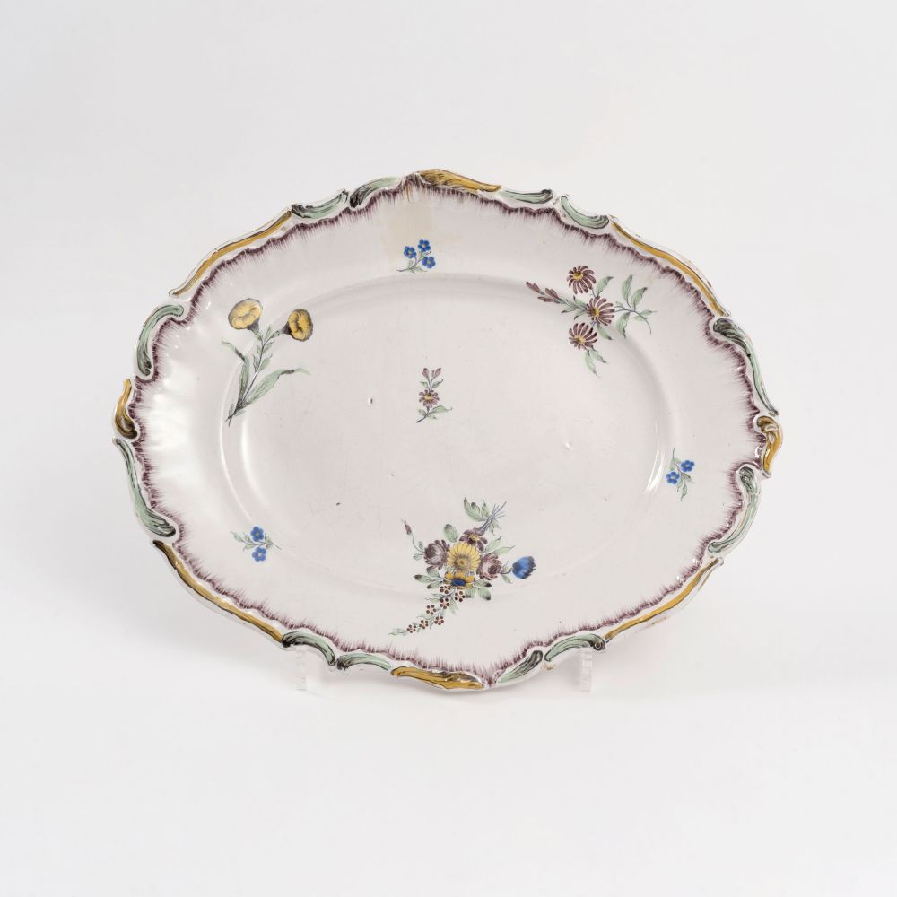 An Oval Faience Dish with Flower Painting