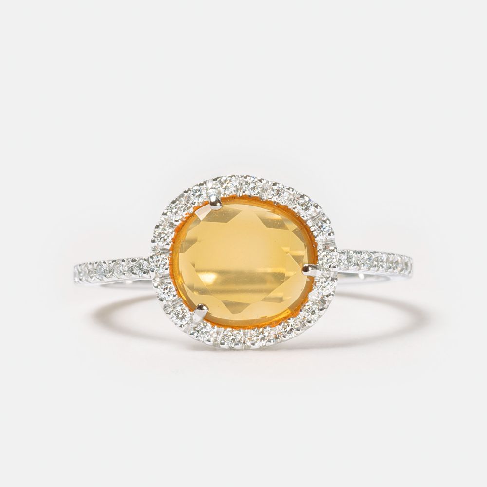 A Fire Opal Diamond Ring