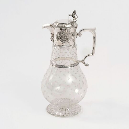A Victorian Decanter with Silver Mounting