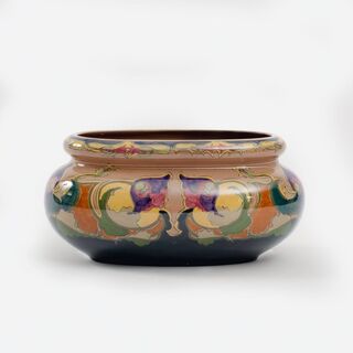 An Art Nouveau Jardinière and Vase with Flowers