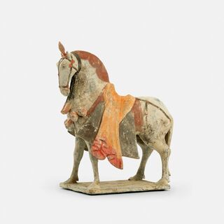 A Painted Pottery Figure of a Caparisoned Horse