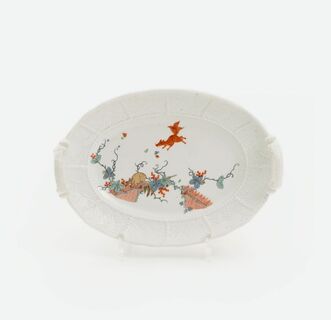 A Small Oval Plate with Squirrel Decor