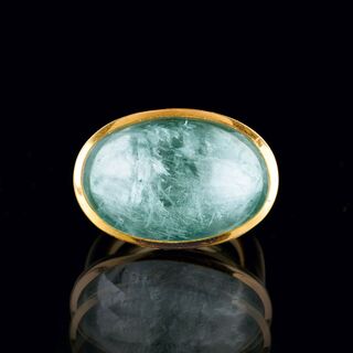 A modern Gold Ring with Aquamarine Cabochon