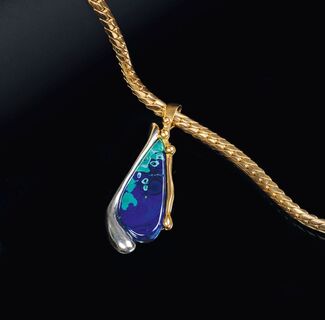 An Azurite Malachite Pendant on Necklace