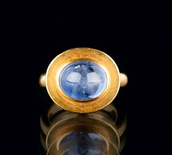 A Gold Ring with Sapphire Cabochon