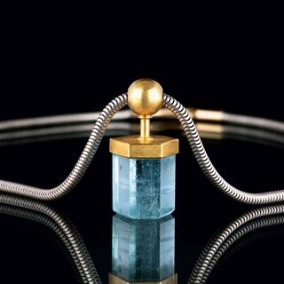 An Aquamarin Crystal Pendant on Necklace