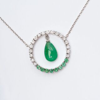 A Diamond Emerald Pendant with pear shaped Emerald on Necklace