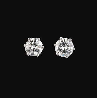 A Pair of Rare-White Solitaire Diamond Earstuds