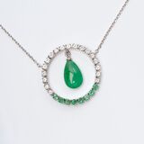 A Diamond Emerald Pendant with pear shaped Emerald on Necklace