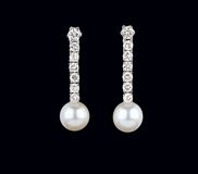 A Pair of Pearl Diamond Earrings