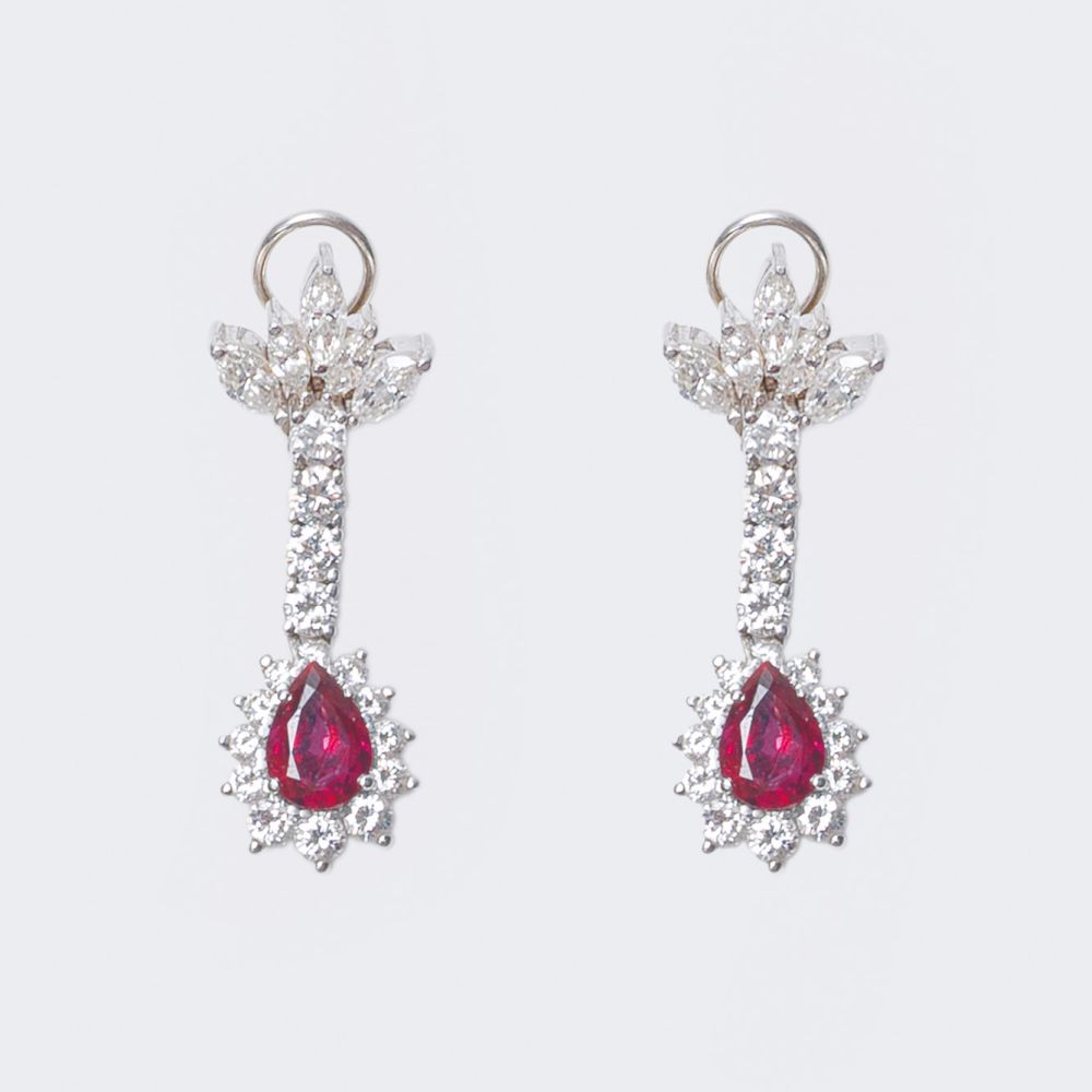 A Pair of Diamond Earrings with natural Rubies