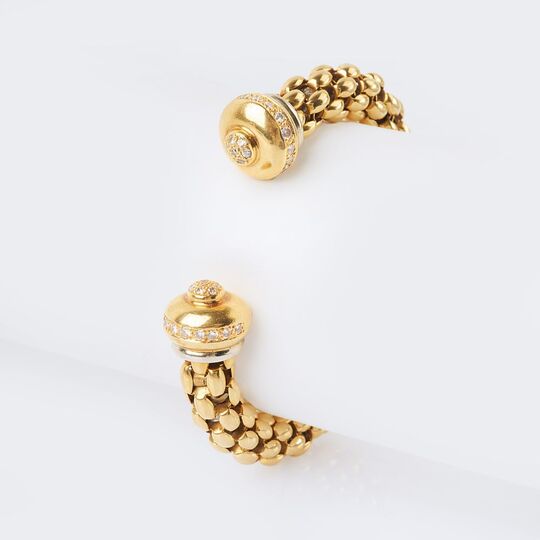 A Gold Bangle Bracelet with Diamonds