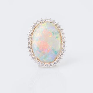 An Opal Diamond Jewellery Set: Pendant and ring