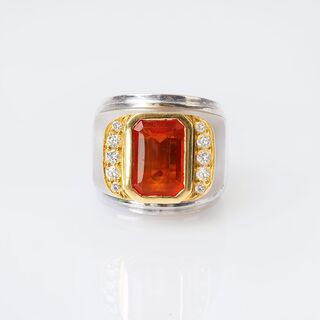 A large Fire Opal Ring with Diamonds