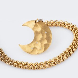 A Crescent Moon Pendant on Necklace