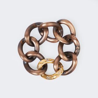 A large Bronze Gold Chain Bracelet with Fancy Diamonds