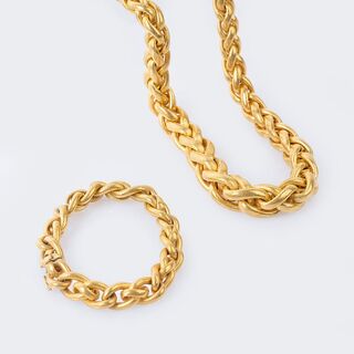 A Gold Necklace with matching Bracelet