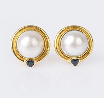 A Pair of Mabé Pearl Earclips with Sapphires