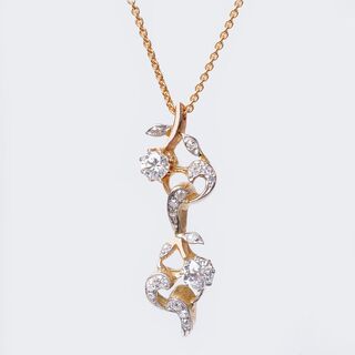 An Art Nouveau Diamond Pendant on Necklace