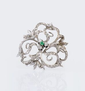 A Diamond Flower Brooch with Emerald