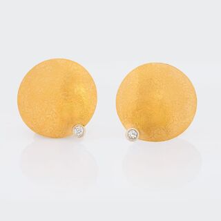 A Pair of Gold Earrings with small Diamonds