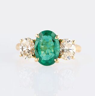 A fine Emerald Diamond Ring