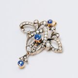 An Art Nouveau Pendant with Diamonds and Sapphires