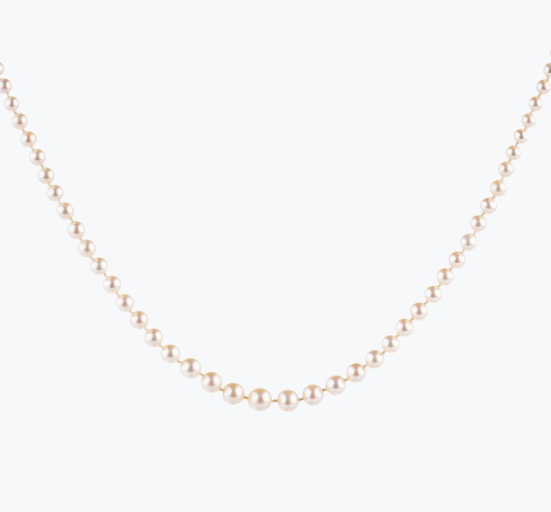 An Art Nouveau Natural Pearl Necklace with Diamond Clasp An Art Nouveau Natural Pearl Necklace with Diamond Clasp