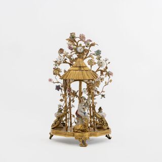 An extraordinary Louis XV Ormolu Centrepiece with Allegory of the Summer and Clock Topping
