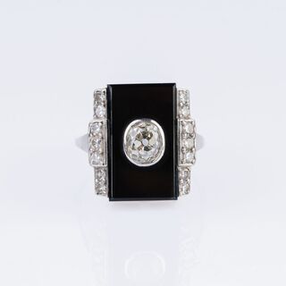 An Art-déco Onyx Diamond Ring