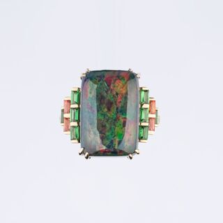 An Opal Ring with Diamonds and Precious Stones
