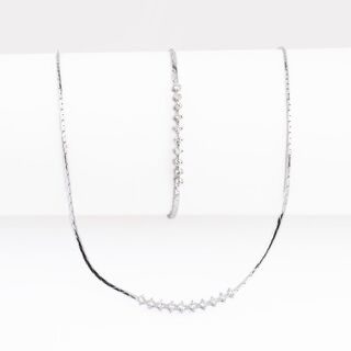 A petite Diamond Necklace with matching Bracelet