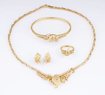 - A Diamond Parure with Necklace, Bangle Bracelet, Ring and Pair of Earclips A Diamond Parure with Necklace, Bangle Bracelet, Ring and Pair of Earclips