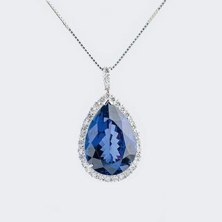 A rare fine Tanzanite with Diamonds as Pendant on Necklace