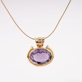 An Amethyst Pendant on Gold Necklace - image 1