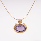 An Amethyst Pendant on Gold Necklace - image 1