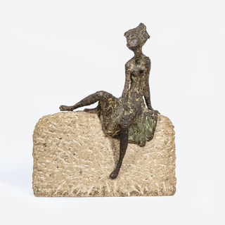 Girl climbing over the wall