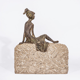 Girl climbing over the wall - image 2